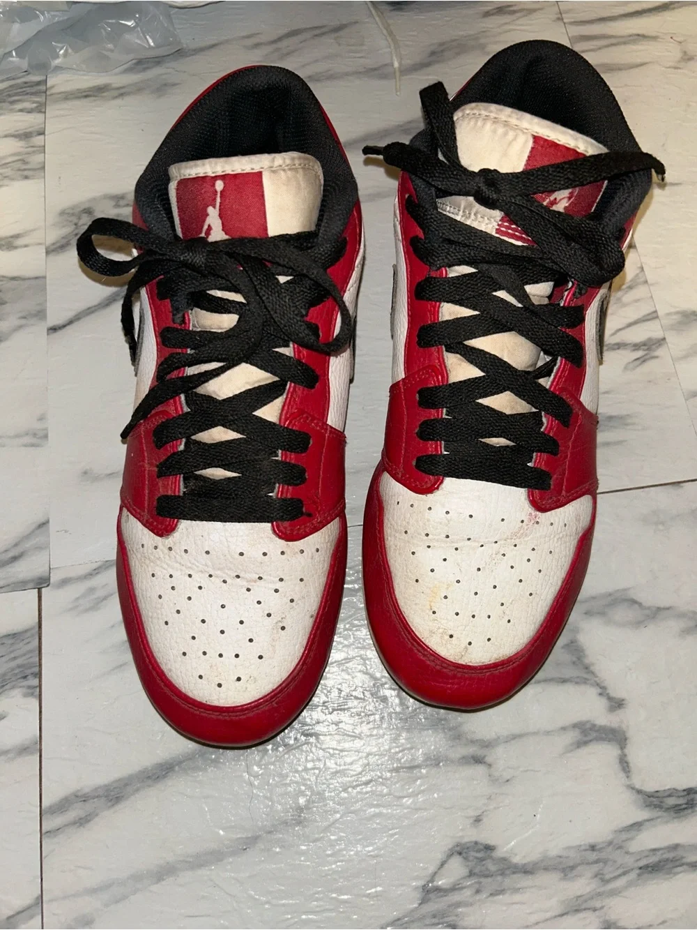 Jordan 1 low cleats.